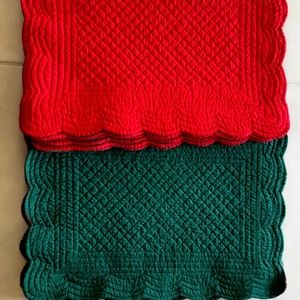 C & F Enterprises quilted placemats 19” x 14”, new unused, reversible, red,green